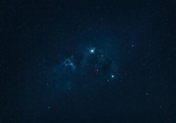 Fototapeta premium Mystical night sky with sparkling stars illuminating the vast blue darkness.