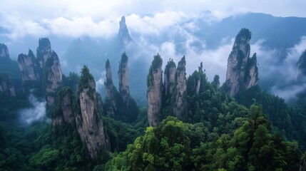 Zhangjiajie's Wonders Surrounded by Clouds and Mists