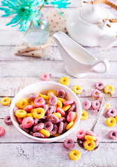 Concept of breakfast food, colorful corn flakes