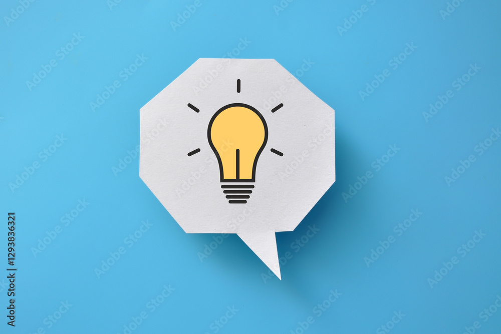 Wall mural a speech balloon with a light bulb pattern on it. a symbol of the emergence of a creative idea