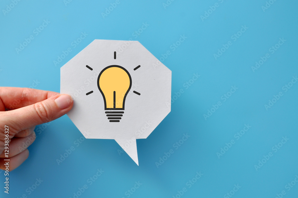 Wall mural a speech balloon with a light bulb pattern on it. a symbol of the emergence of a creative idea