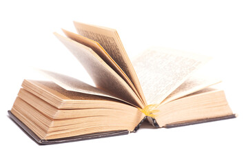 Open old book isolated on white background.