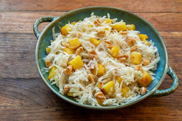Black radish and baked potato salad with walnuts and olive oil. 