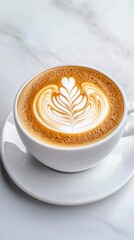 Exquisite Latte Art in a White Ceramic Cup with Saucer on Elegant Marble Surface Artistic Coffee
