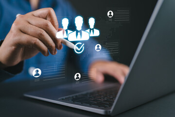 Human Resources Management Concepts. Human Resources Manager use stylus pen point to human icons for select hiring, HRM, CRM, Recruitment Consultants, Headhunter, recruitment agency.