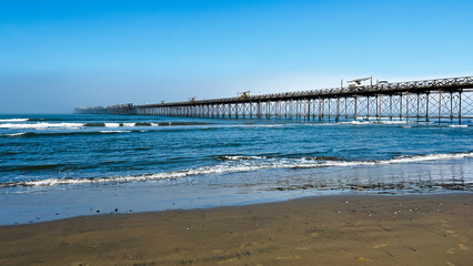 Capture of Muelle De Pimentel on Playa Pimentel, along the Pacific coast in Peru. This pier is today tourist attraction showing rich local culture as well as explaining a history. .