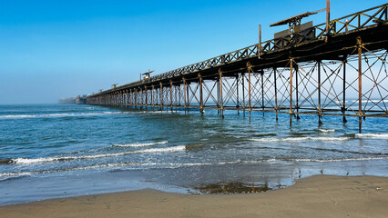 Capture of Muelle De Pimentel on Playa Pimentel, along the Pacific coast. This pier is today tourist attraction showing rich local culture as well as explaining a history. . 