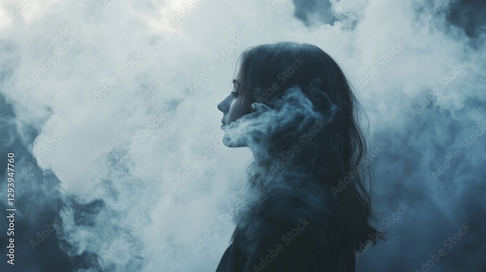 Poster a solitary figure stands in profile, lost in contemplation as fog swirls around, creating an etherea
