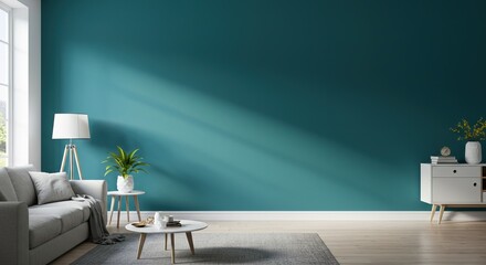 A modern living room features a teal accent wall, gray sofa, side tables, floor lamp, white cabinet, and gray rug. Sunlight streams in.