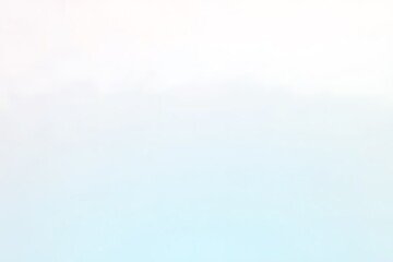 Fototapeta premium simple gradient transitions from soft white to light blue.