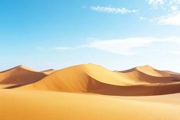 Majestic Desert Landscape Featuring Towering Sand Dunes Under a Clear Blue Sky With Wisps of Clouds on a Bright Sunny Day
