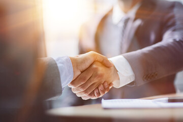 Businessman handshake for teamwork of business merger and acquisition
