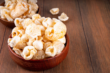 Cracklings or skwarki, fragrant crispy snack made from fried skin of the pork with spices. British, Scottish, Eastern European traditional salted scratchings