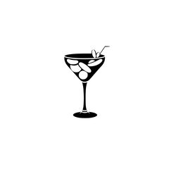 Black Martini Glass with Olives and a Straw in a White Setting.