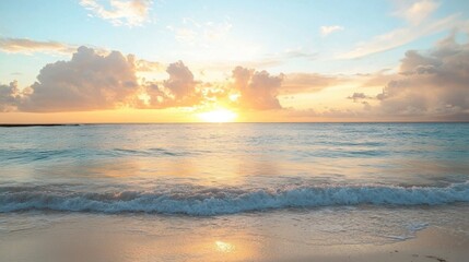Obraz premium Calm ocean waves washing over a white sand beach under a dramatic sunset sky