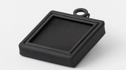 Naklejka premium Compact keychain with a hidden storage compartment, white backdrop