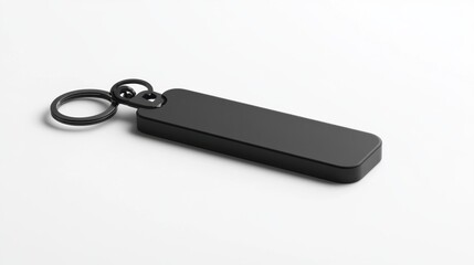 Modern minimalist keychain with a matte black finish, isolated on white