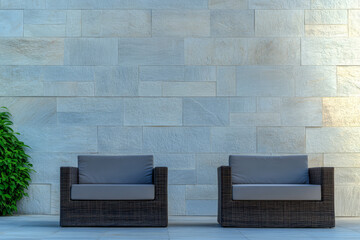 Elegant outdoor lounge area with modern chairs against stone wall