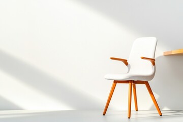 Fototapeta premium unoccupied modern office chair stands beside minimalist wooden desk in spacious room with ample natural light showcasing