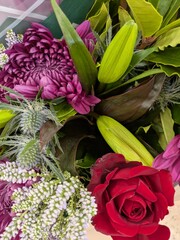 Fototapeta premium Bunched up bouquet flowers for sale in a shop close up for present gift