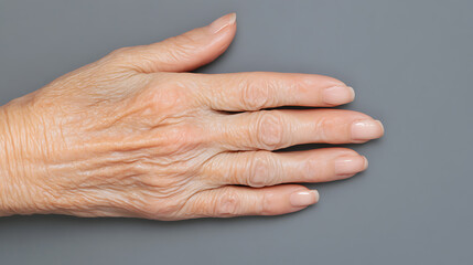 Fototapeta premium Hand in Maturity: A Close-Up Portrayal