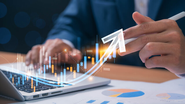 Concept of financial growth and investment success. businessman analyzing rising stock market trends, emphasizing stock trading, forex trends, and cryptocurrency market performance