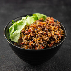 Rice lentil and vegetables snack fresh tasty food dish vegetarian vegan food no meat delicious gourmet food background on the table rustic food top view copy space keto and paleo diet