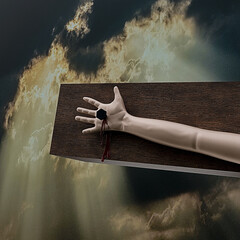 Symbolic Representation of the Crucifixion of Jesus Christ with a Nailed Hand and Divine Light in the Background