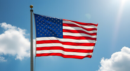 Obraz premium American Flag Waving Proudly Under a Sunny Sky: A Symbol of Freedom and Patriotism