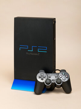 Pavia, Lombardy, Italy - December 27, 2024: Sony PlayStation 2 game console, the best-selling console of all time with 160 million units sold. Shown at Ctrl+Alt Museum.