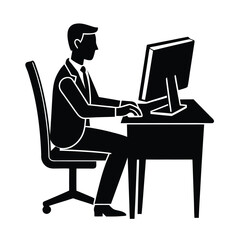 Focused businessperson silhouette actively working on desktop computer
