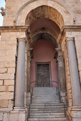 Historic Building Exterior with Arched Entrance