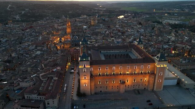 Toledo at night, aerial view, Castile La Mancha drone view, Alcazar de Toledo with night illumination 