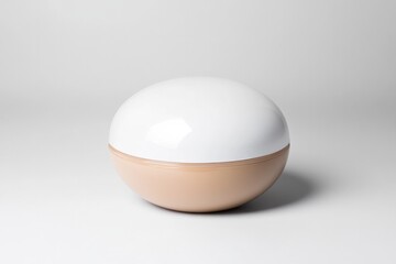 Sleek, modern lamp design featuring smooth, rounded shape and so