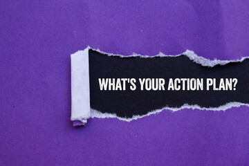 What's your action plan message written on ripped torn purple paper on black background. Conceptual...