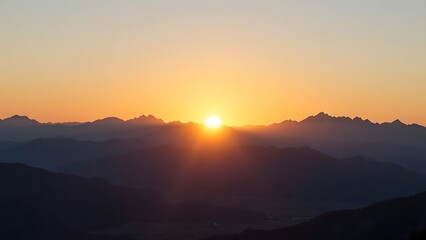 Obraz premium Sunrise Over Majestic Mountain Ranges