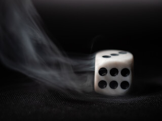 Smoke clears to reveal dice 