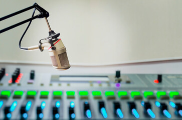 Professional microphone and sound mixer in radio station studio