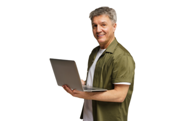 Smiling middle-aged man holding a laptop while standing against a plain background