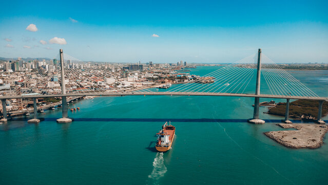 Aerial View of Cebu-Cordova Bridge with Cargo Ship in Cebu City, Philippines