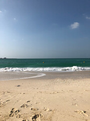 Sea and golden beach with sun in summer