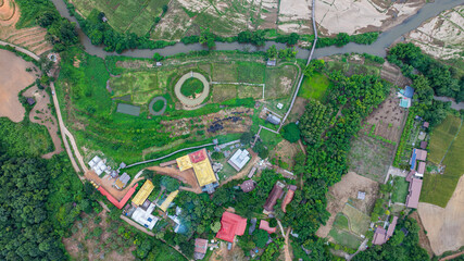 Beautiful view of Zu Tong Pae bamboo bridge pass rice field at sunset in Mae Hong Son, Thailand. in the morning there is some mist and cold weather around the bridge with green rice fields.
