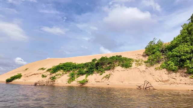 Dunes and lagoons of Vassouras, Lencois Maranhenses, Barreirinhas in Brazil. White sand dunes with pools of fresh and transparent water.