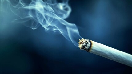 A cigarette burns softly, wisps of smoke curling upward against a deep blue backdrop. The ambiance evokes contemplation and a hint of nostalgia, inviting reflection on the moment