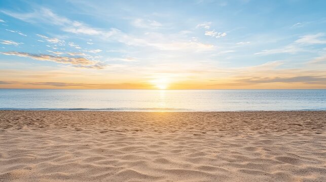 Breathtaking sunset over a serene beach with tranquil blue sky, perfect wallpaper