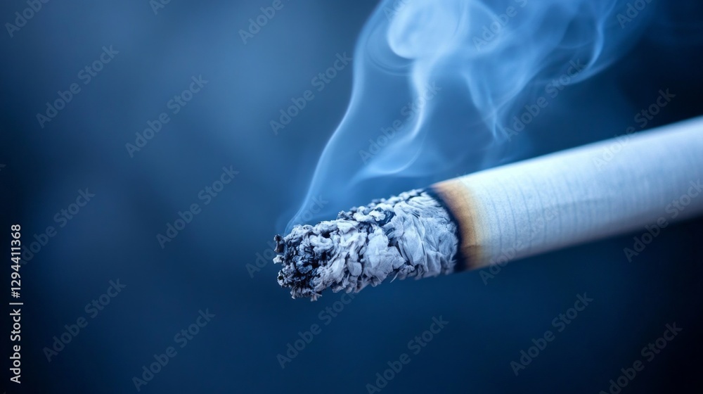 Poster Wisps of smoke curl gracefully from a burning cigarette, creating an ethereal atmosphere. The deep blue backdrop emphasizes the calmness that lingers in the air