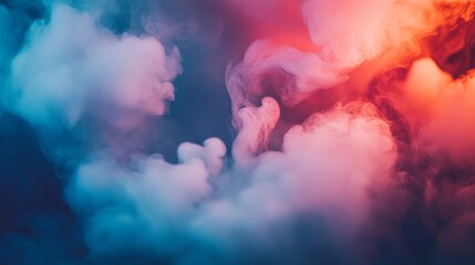 Vibrant clouds of smoke in shades of pink and blue swirl together, forming an abstract tapestry. The captivating colors evoke a sense of wonder and creativity