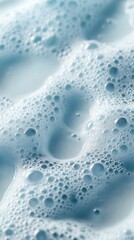Obraz premium Close-Up of Cleaning Foam with Blue Bubbles, Freshness and Purity
