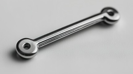 Polished Metal Connector on a Light Background