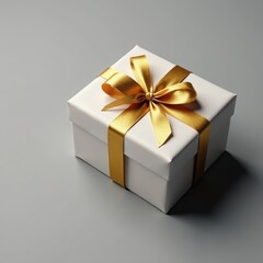 Obraz premium Golden ribbon wrapped around a gift box on a neutral gray background, modern, gift box, neutral